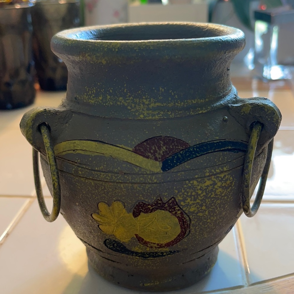 Unique piece of handmade and painted pottery.